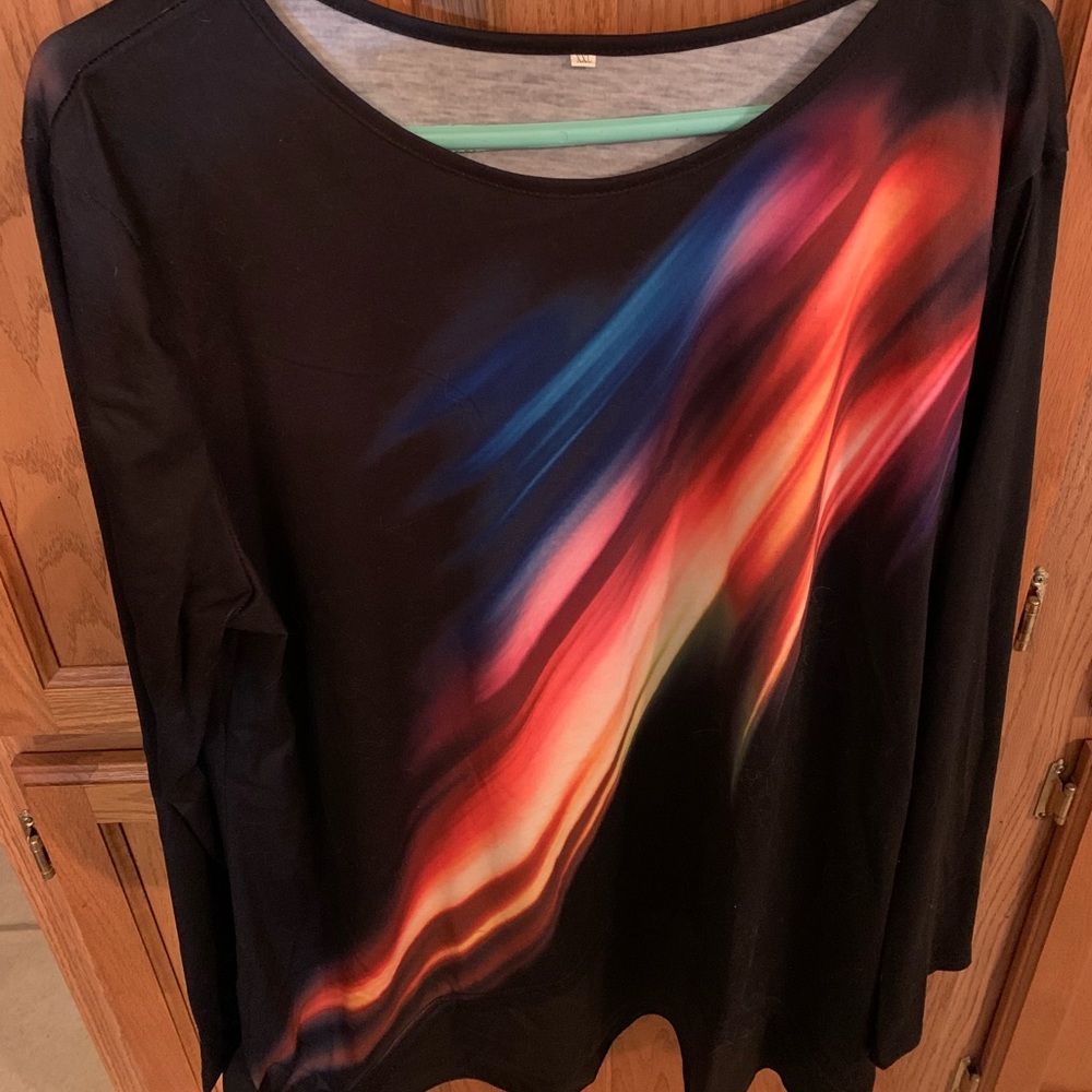 Long sleeve shirt, with rainbow design down it.